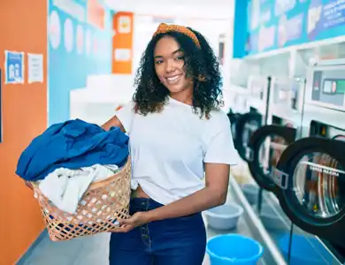 Girl With Laundry Shutterstock 1892902165